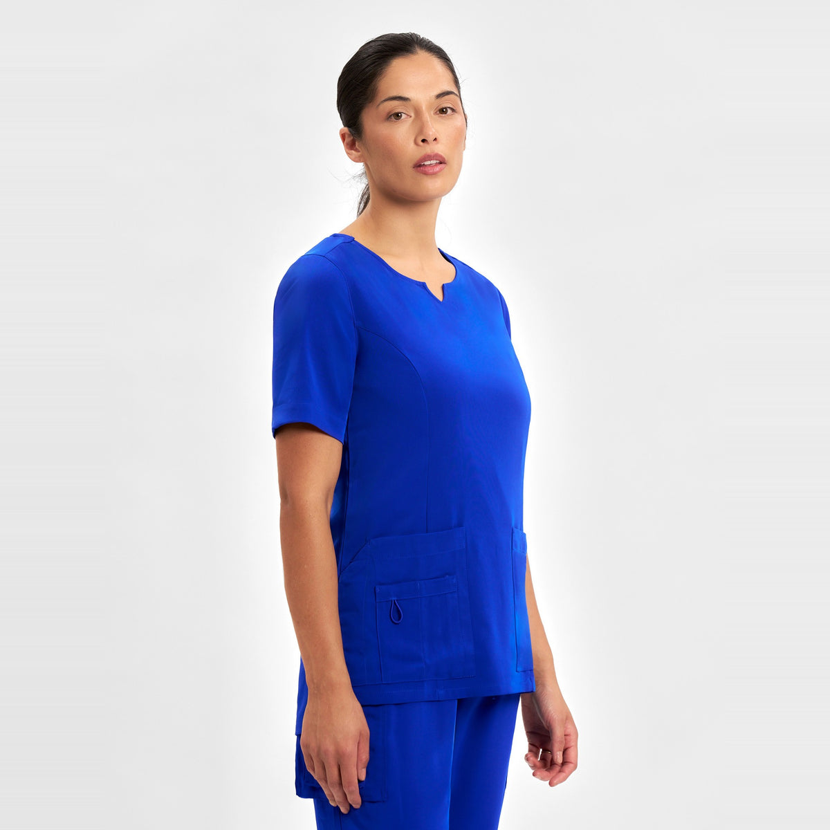 Inaura Avery Womens Round Neck Scrub Top CST942LS in Electric Blue, worn by model, view 3