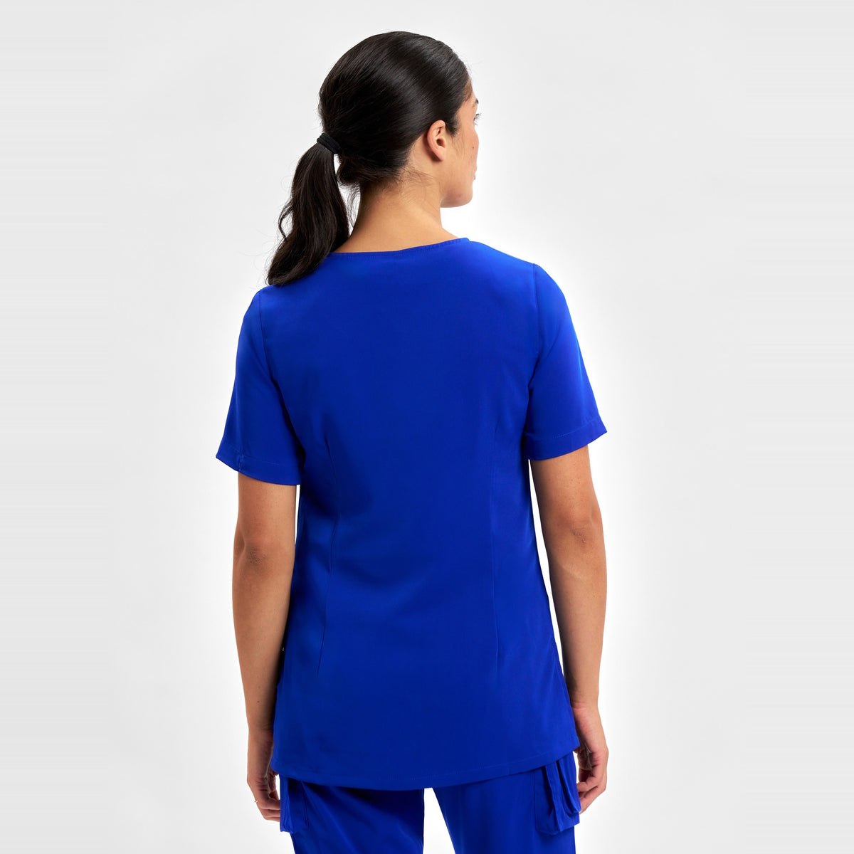 Inaura Avery Womens Round Neck Scrub Top CST942LS in Electric Blue, worn by model, view 4