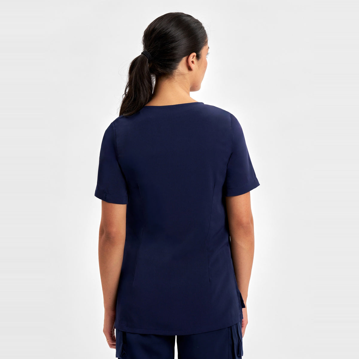 Inaura Avery Womens Round Neck Scrub Top CST942LS in Midnight Navy, worn by model, view 4