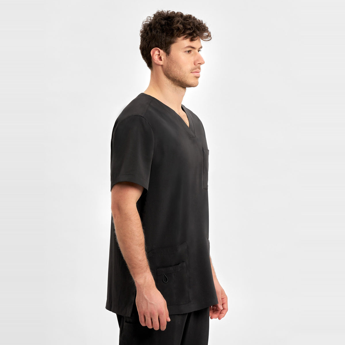 Inaura Avery Mens V-Neck Scrub Top CST945MS in Black, worn by model, view 3