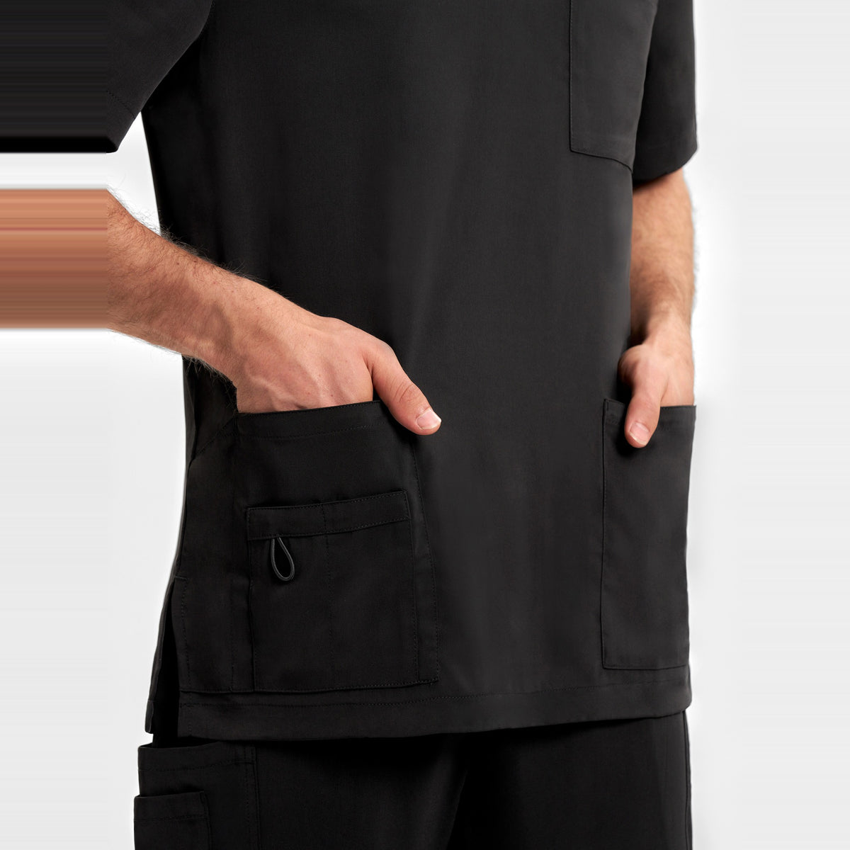 Inaura Avery Mens V-Neck Scrub Top CST945MS in Black, worn by model, view 5