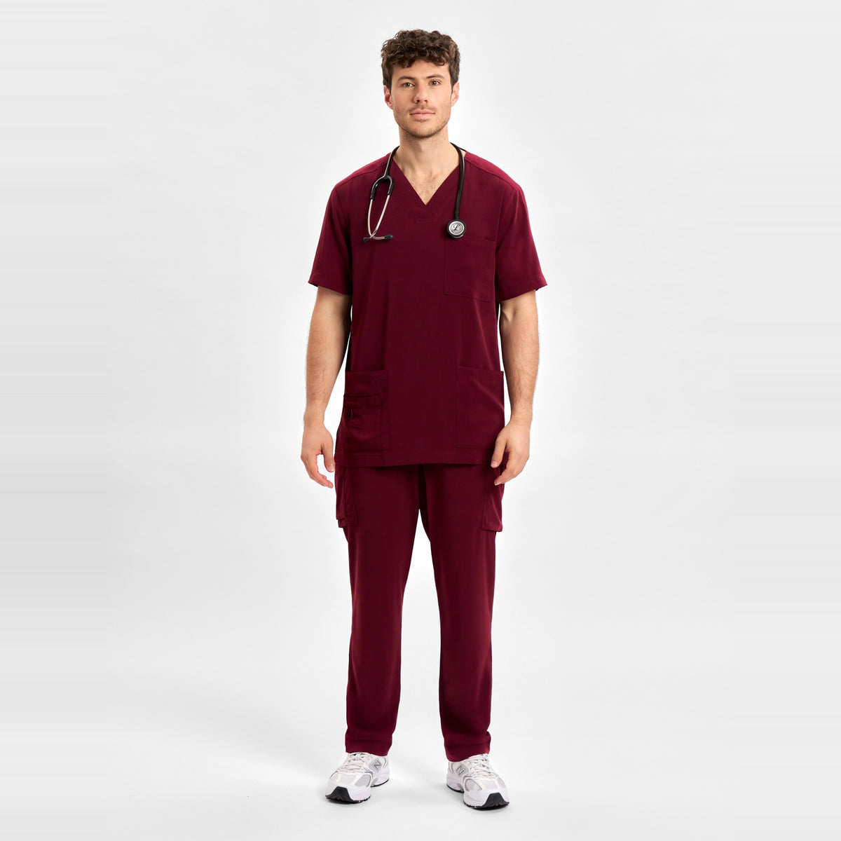 Inaura Avery Mens V-Neck Scrub Top CST945MS in Burgundy, worn by model, view 2