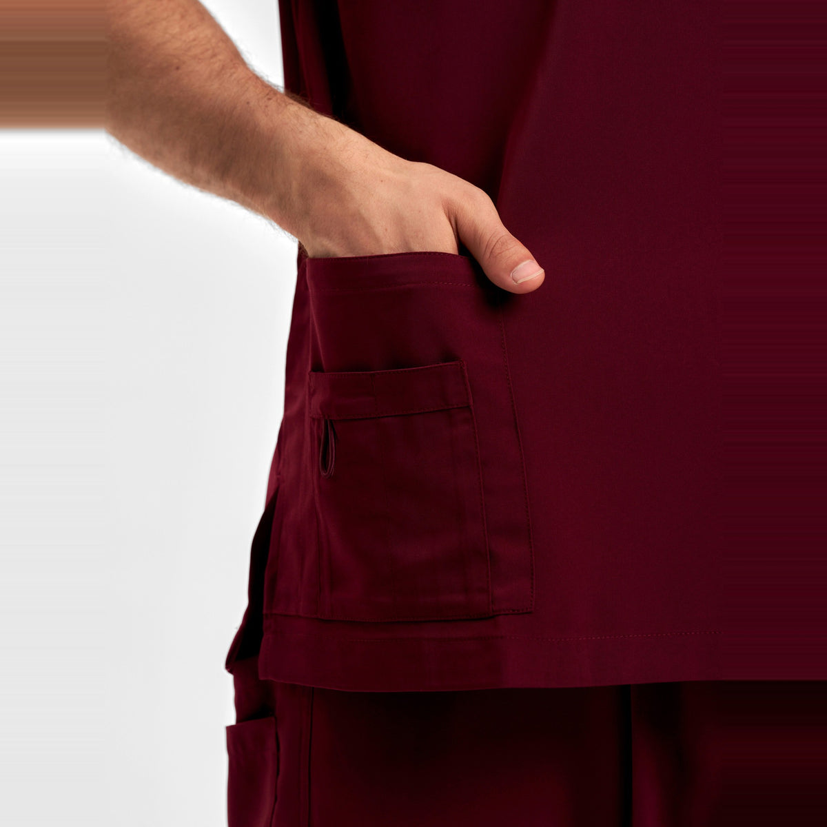 Inaura Avery Mens V-Neck Scrub Top CST945MS in Burgundy, worn by model, view 6