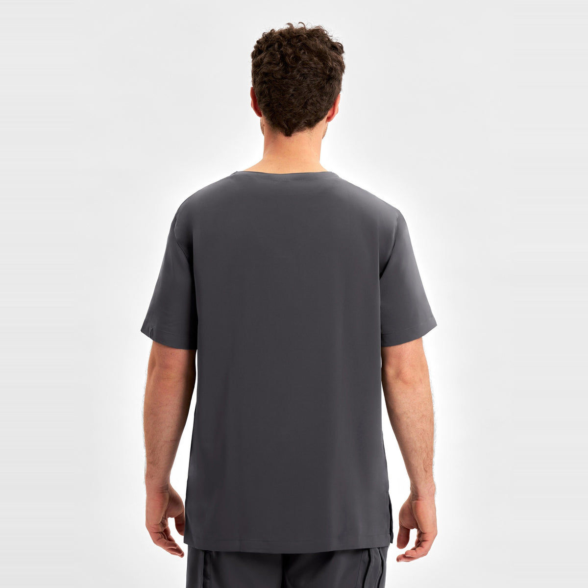 Inaura Avery Mens V-Neck Scrub Top CST945MS in Charcoal, worn by model, view 5