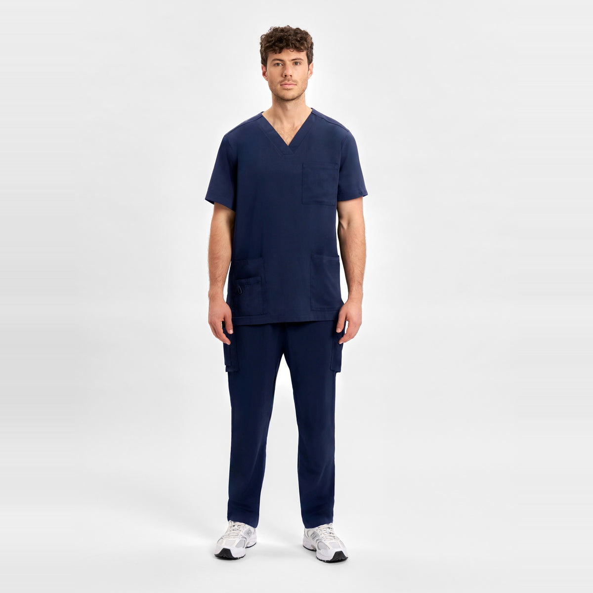 Inaura Avery Mens V-Neck Scrub Top CST945MS in Midnight Navy, worn by model, view 2