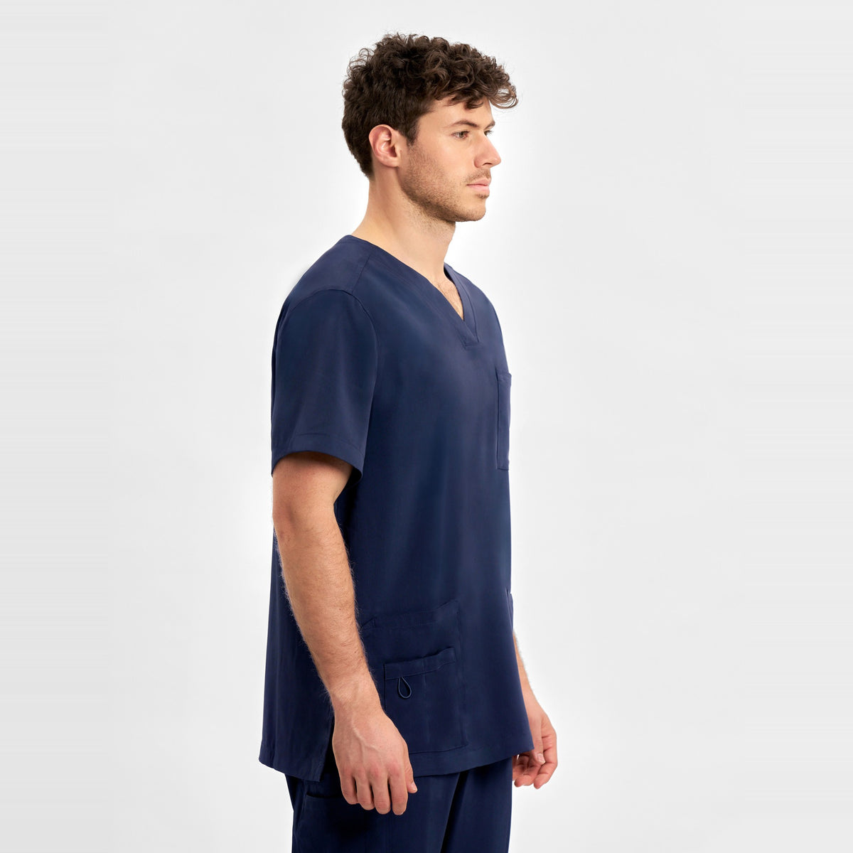 Inaura Avery Mens V-Neck Scrub Top CST945MS in Midnight Navy, worn by model, view 3