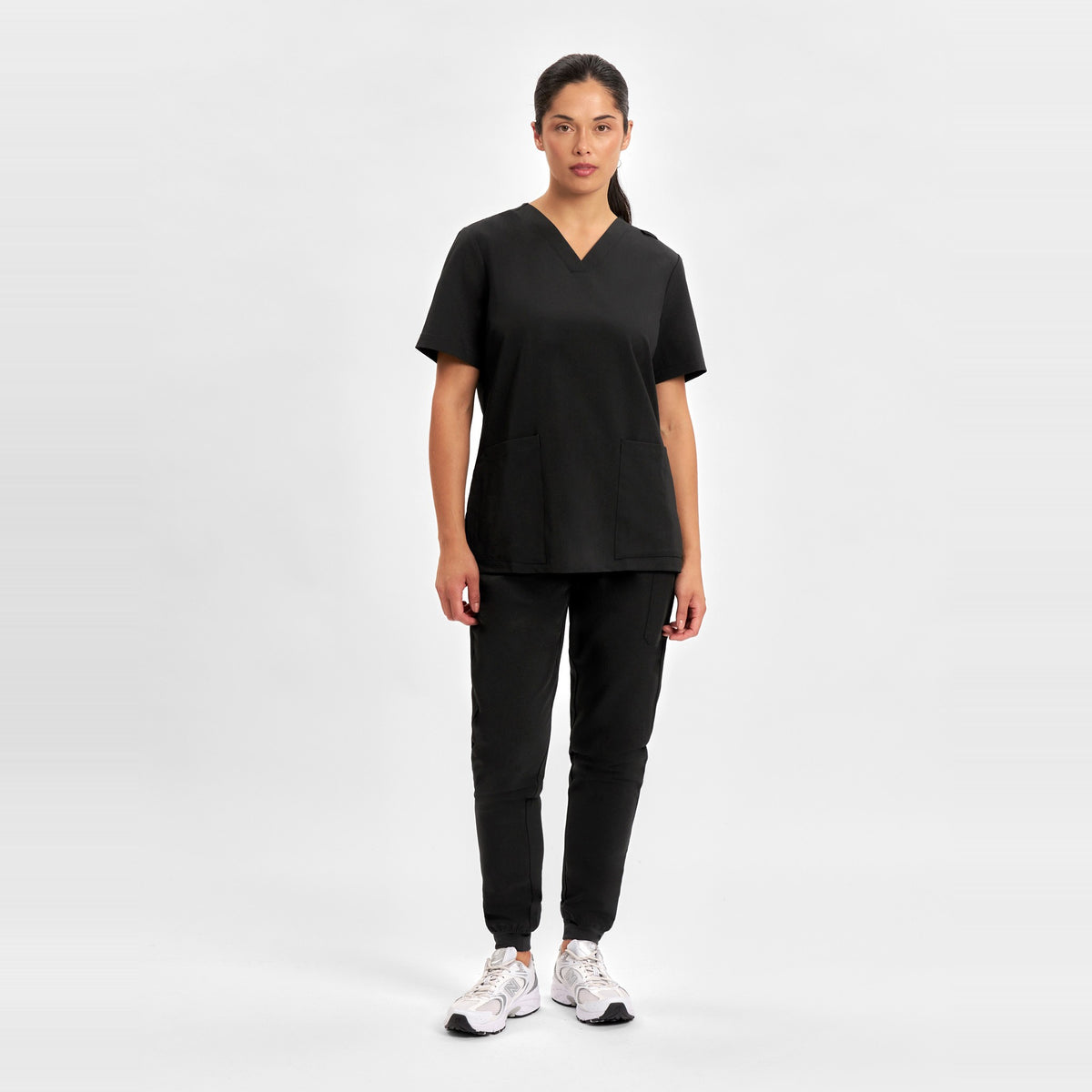 Inaura Pulse Womens V-Neck Scrub Top CU543LS in Black, worn by model, view 2