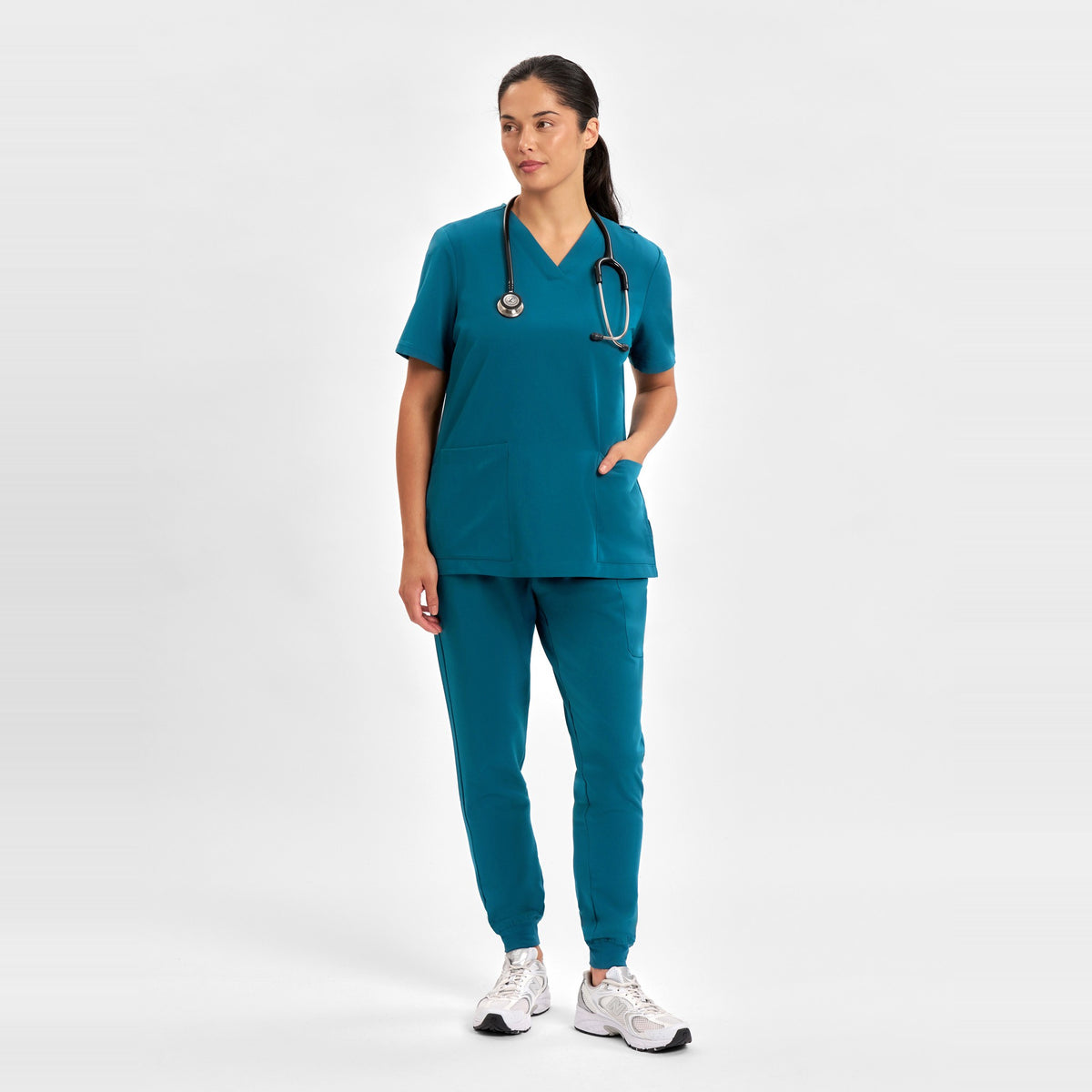 Inaura Pulse Womens V-Neck Scrub Top CU543LS in Caribbean Blue, worn by model, view 2
