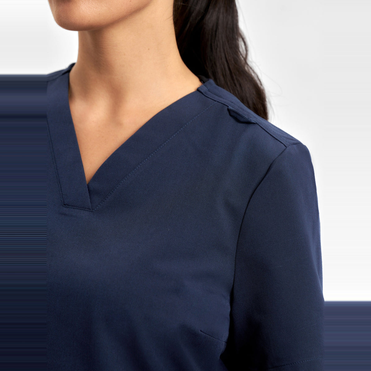 Inaura Pulse Womens V-Neck Scrub Top CU543LS in Midnight Navy, worn by model, view 5