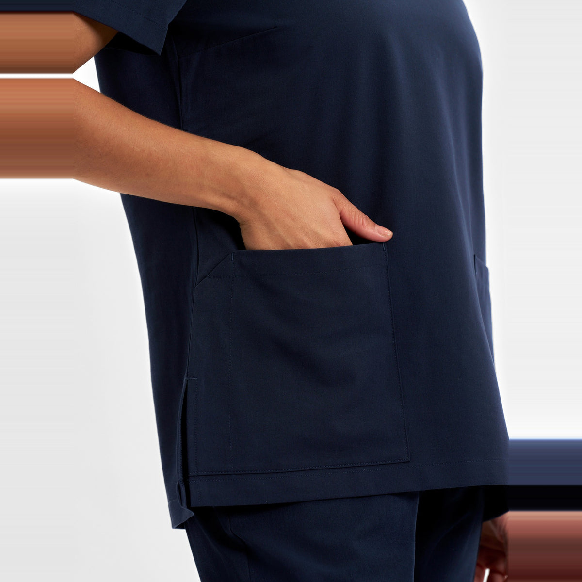 Inaura Pulse Womens V-Neck Scrub Top CU543LS in Midnight Navy, worn by model, view 6