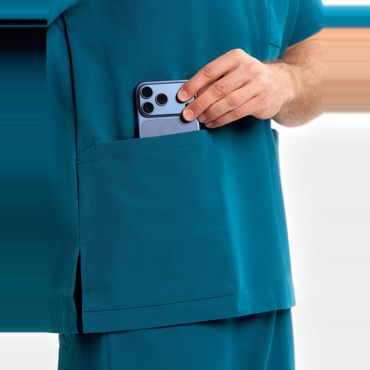 Inaura Pulse Unisex V-Neck Scrub Top CU544US in Caribbean Blue, worn by model, view 8