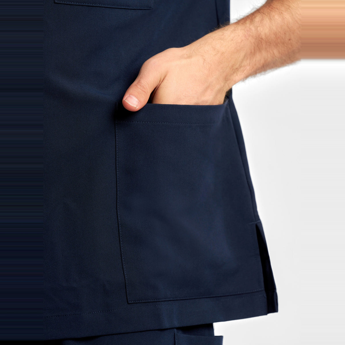 Inaura Pulse Unisex V-Neck Scrub Top CU544US in Midnight Navy, worn by model, view 7