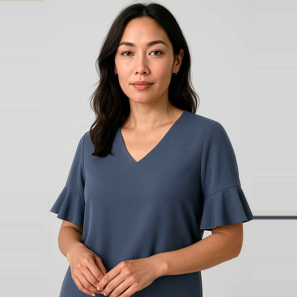 Biz Corporates Aria Womens Fluted Sleeve Blouse RB966LS in Storm Blue, worn by model