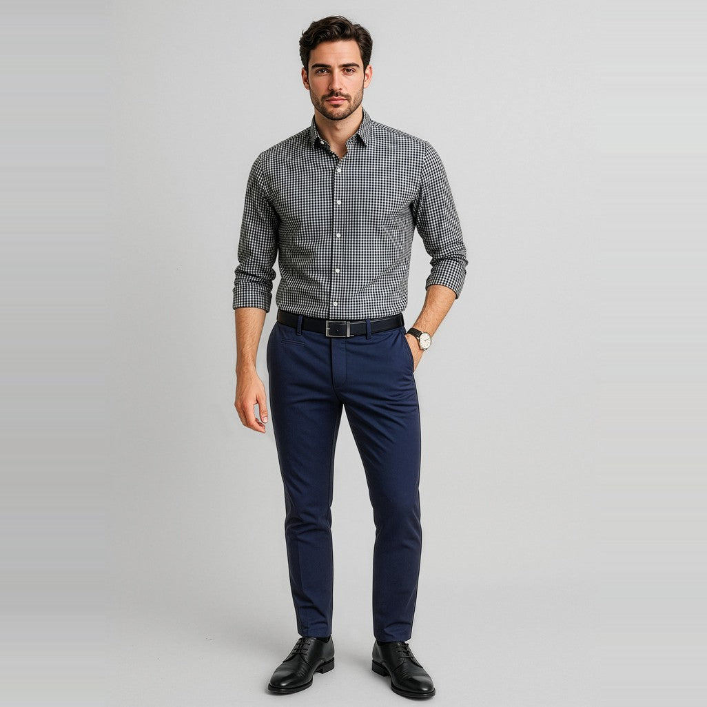 Biz Corporates Traveller Mens Tapered Stretch Chino Pant RGP263M in Navy, worn by model
