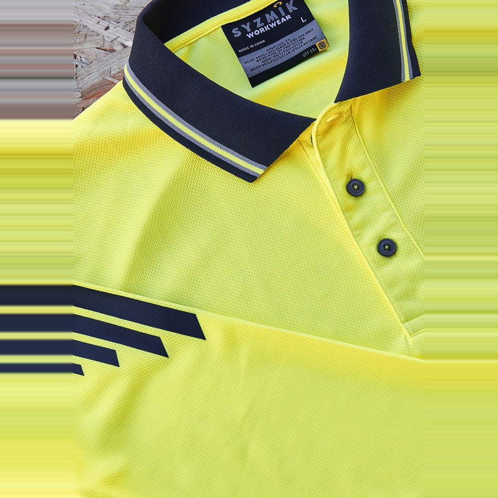 Syzmik Mens Hi Vis Flux Long Sleeve Polo ZH310 in Yellow/Navy, worn by model, view 4