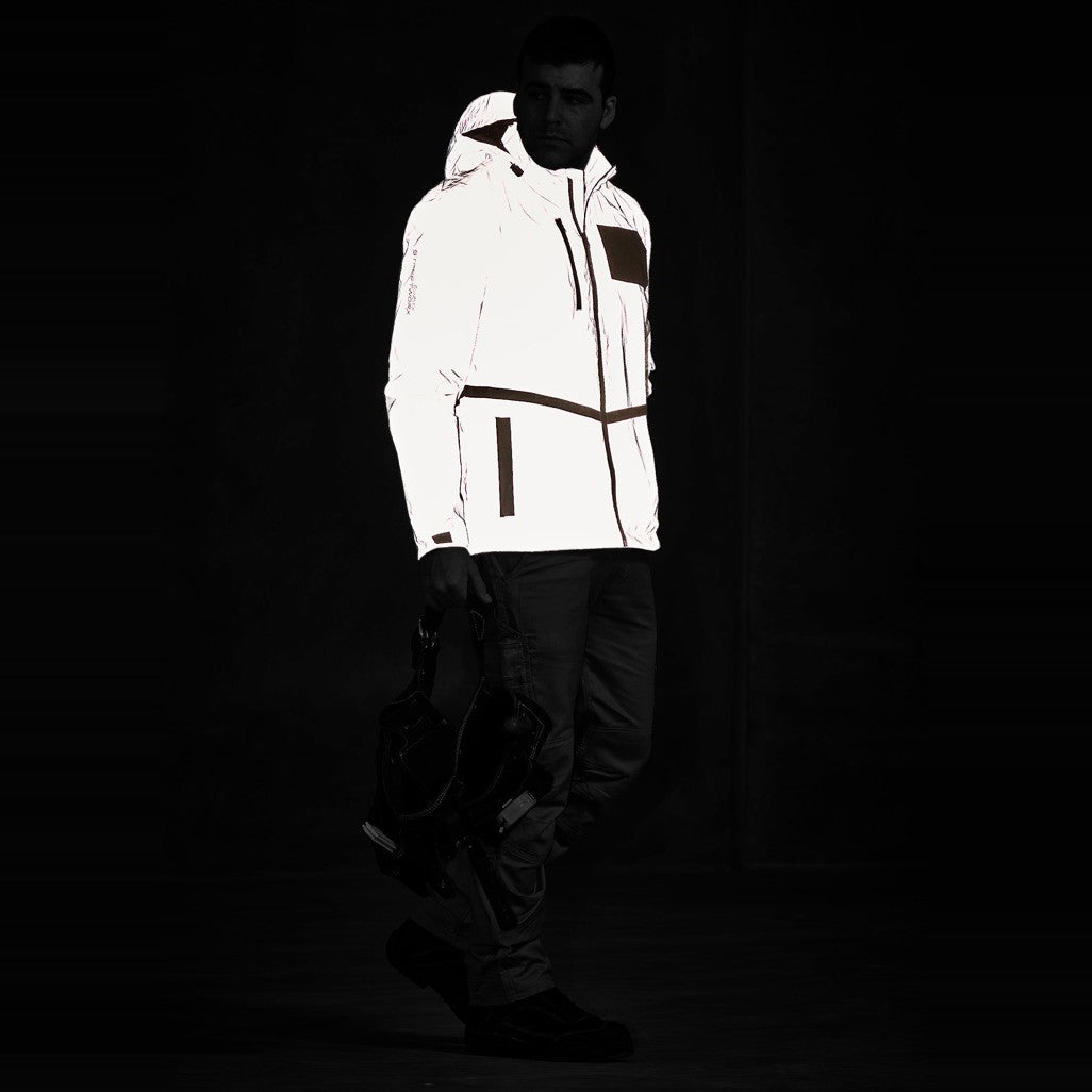 Syzmik Unisex Streetworx Reflective Waterproof Jacket ZJ380 in Reflective Silver, worn by model, view 4