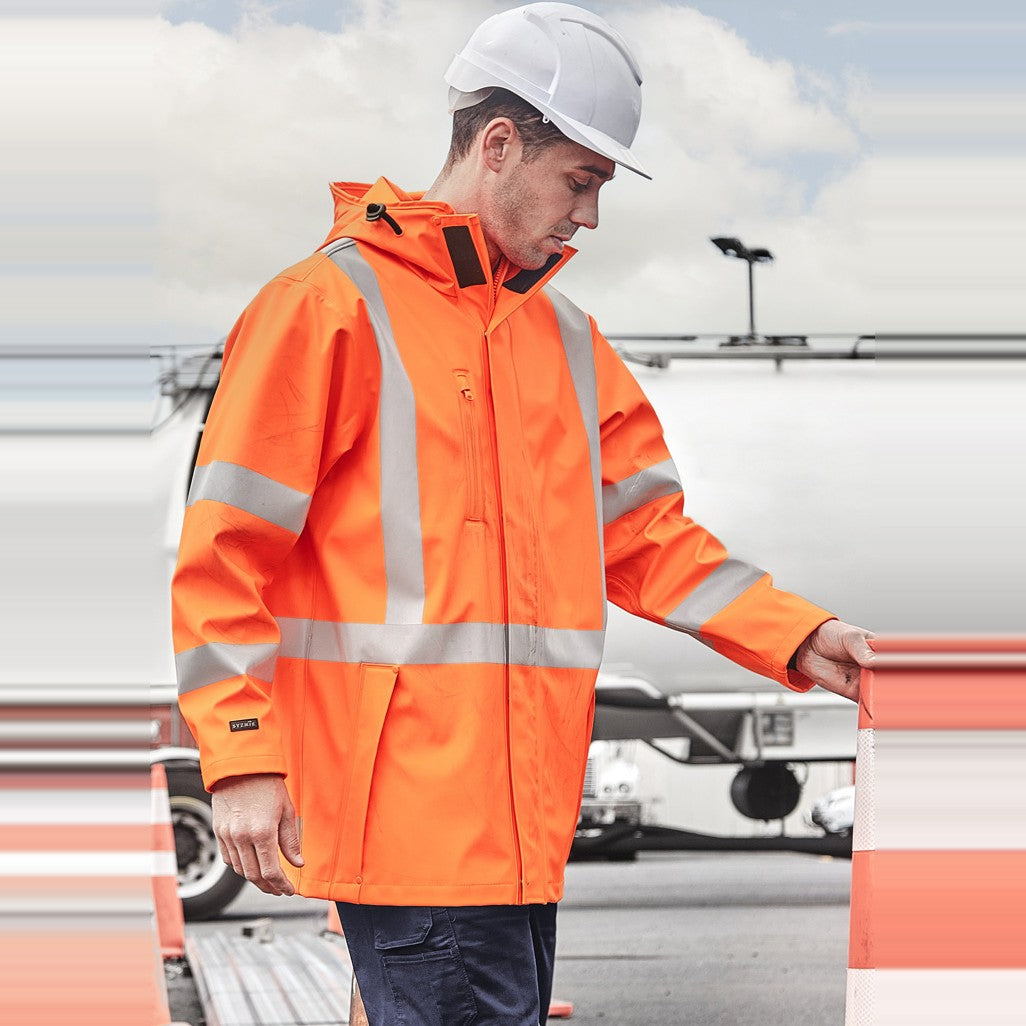 Syzmik Mens Hi Vis X Back Heavy Duty Waterproof Jacket ZJ620-AU in Orange, worn by model