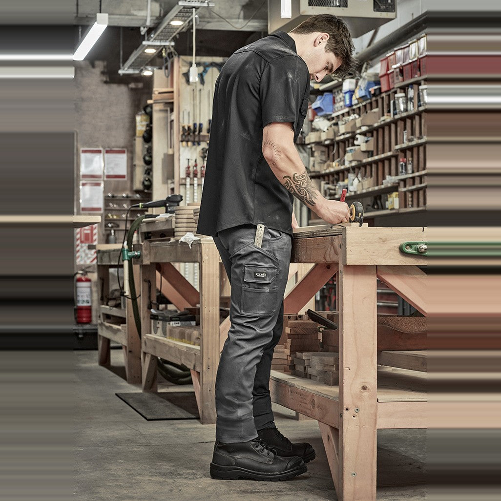 Syzmik Mens Essential Basic Stretch Cargo Pant ZP230, worn by model