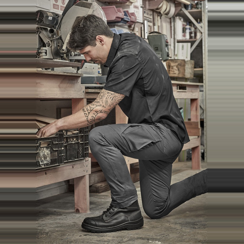 Syzmik Mens Essential Basic Stretch Cargo Pant ZP230 in Charcoal, worn by model, view 2