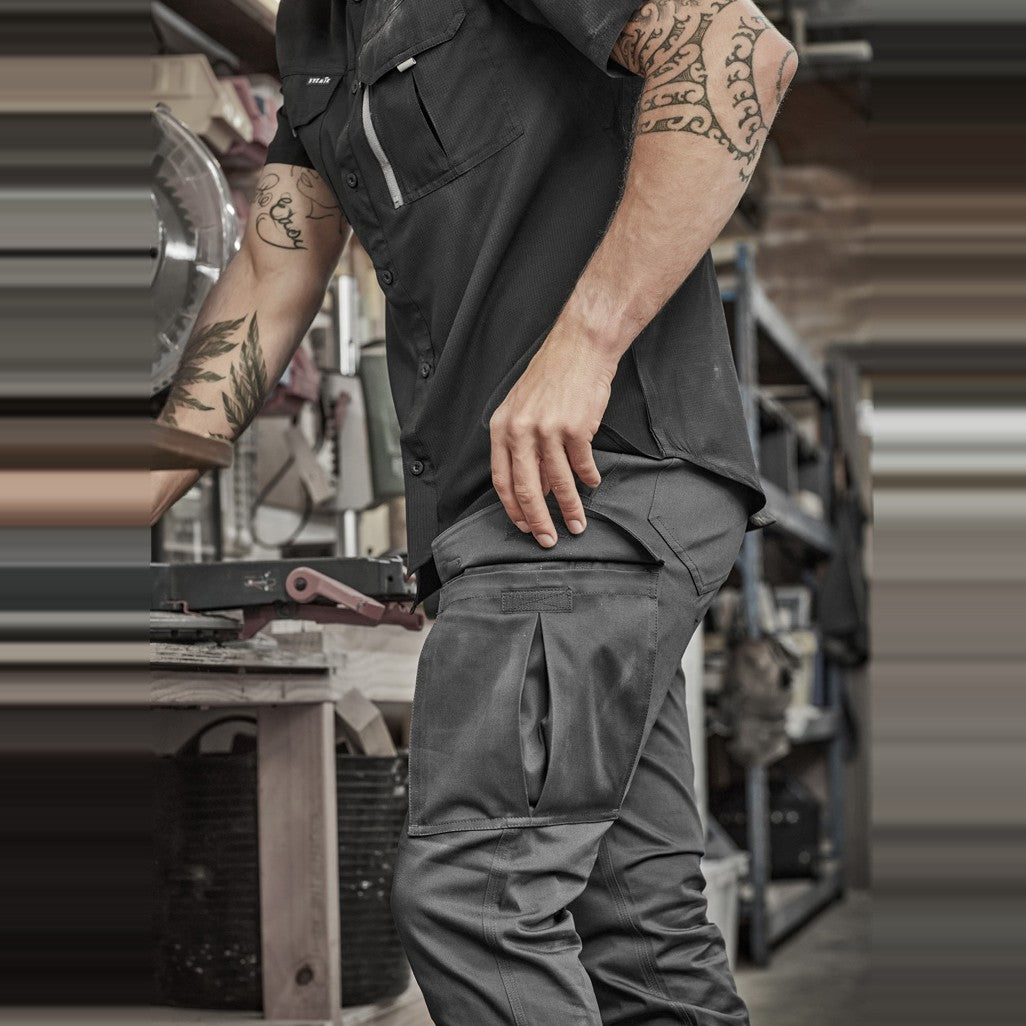 Syzmik Mens Essential Basic Stretch Cargo Pant ZP230 in Charcoal, worn by model, view 3