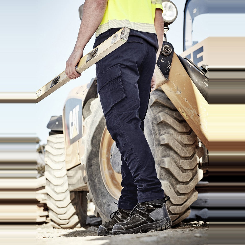 Syzmik Mens Streetworx Curved Cargo Pant ZP360 in Navy, worn by model