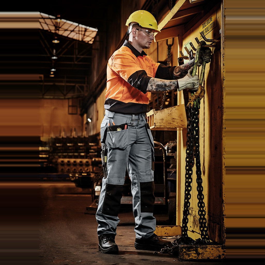 Syzmik Mens Ultralite Multi-Pocket Pant ZP509 in Charcoal/Black, worn by model