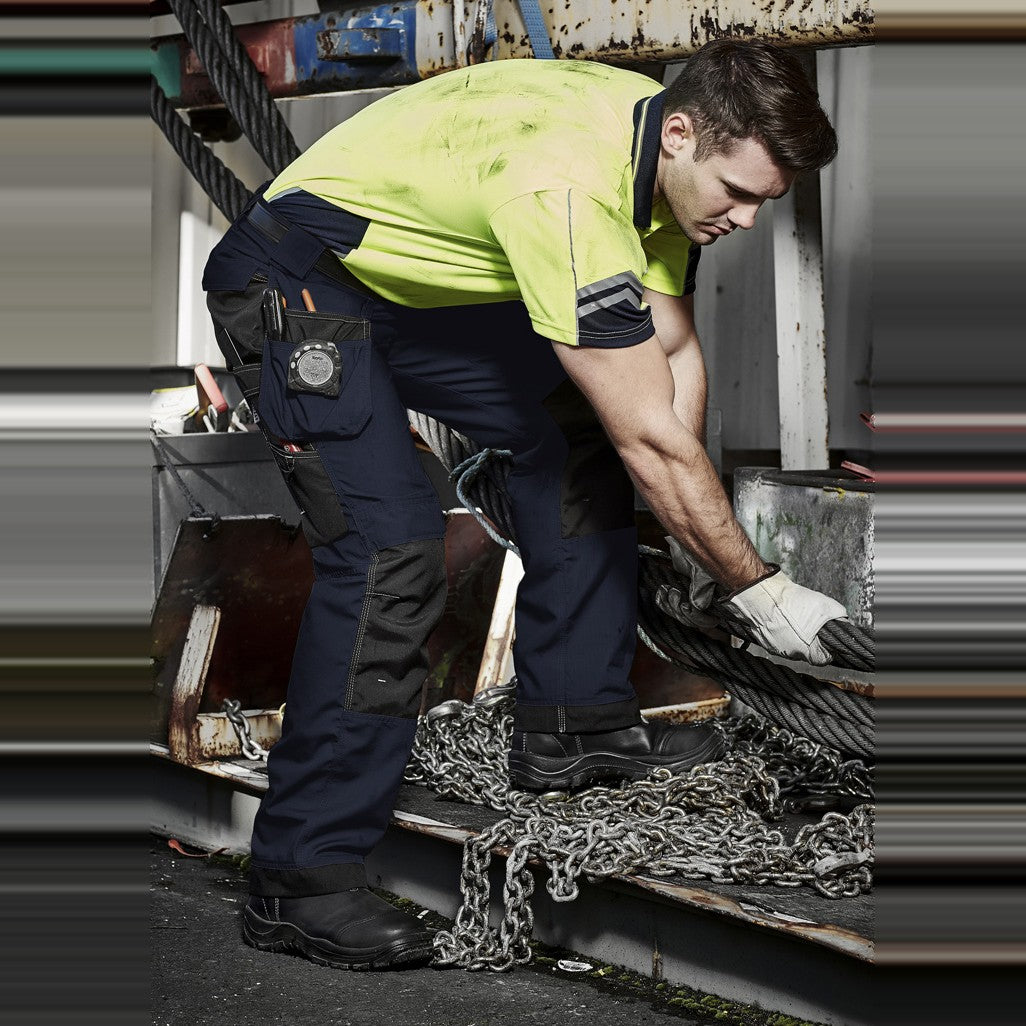 Syzmik Mens Ultralite Multi-Pocket Pant ZP509 in Navy/Black, worn by model