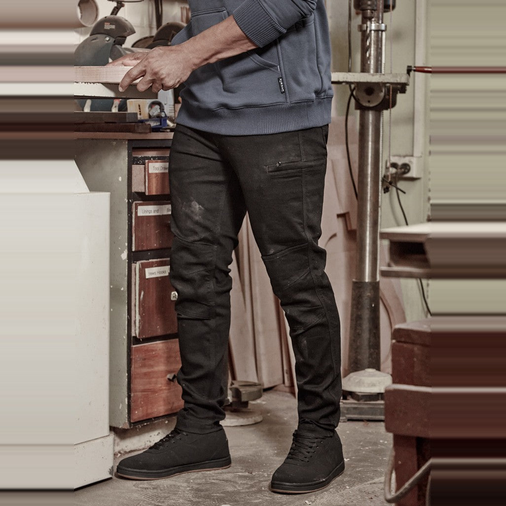 Syzmik Mens Streetworx Stretch Jean ZP540 in Black, worn by model, view 2