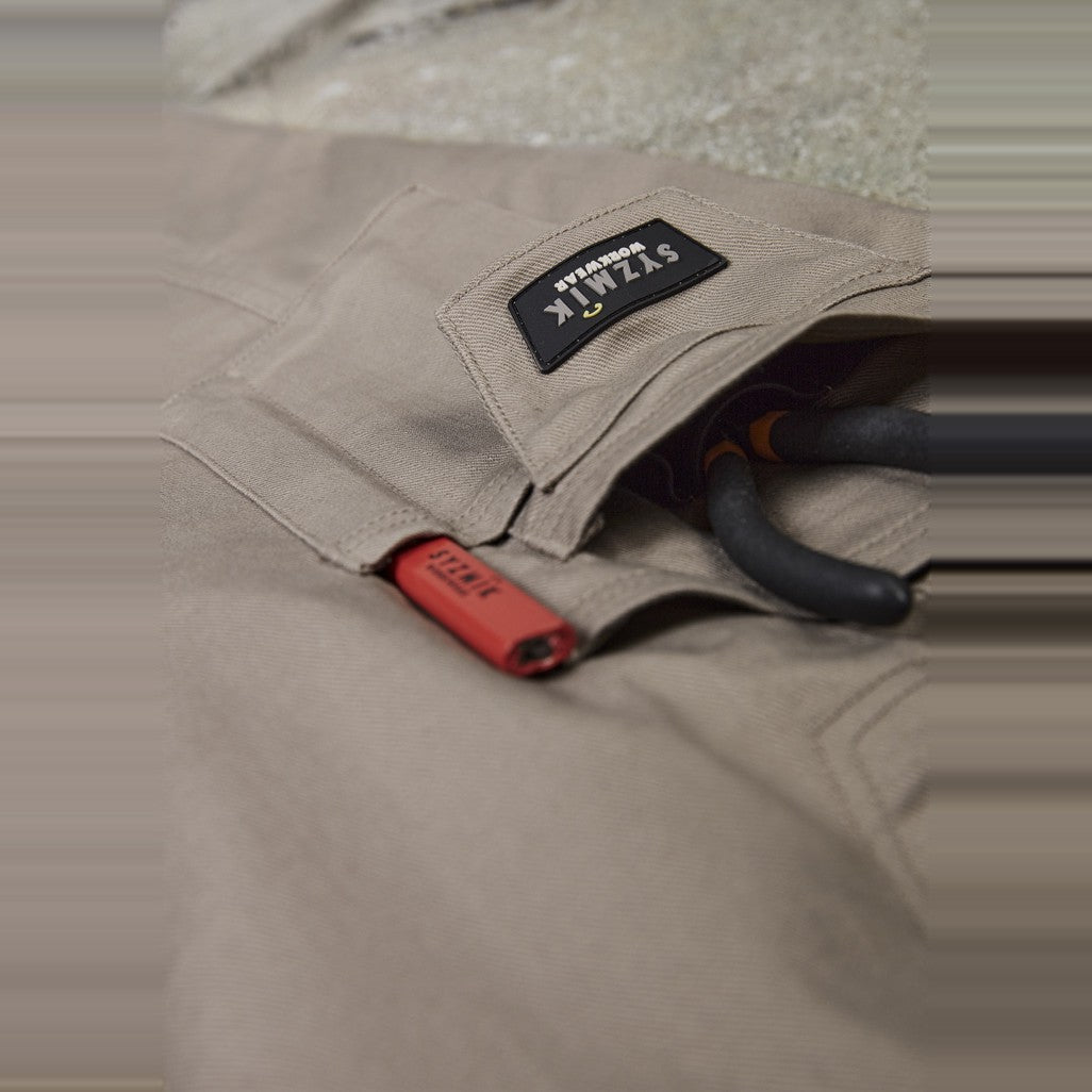 Syzmik Mens Rugged Cooling Stretch Pant ZP604 in Khaki, worn by model