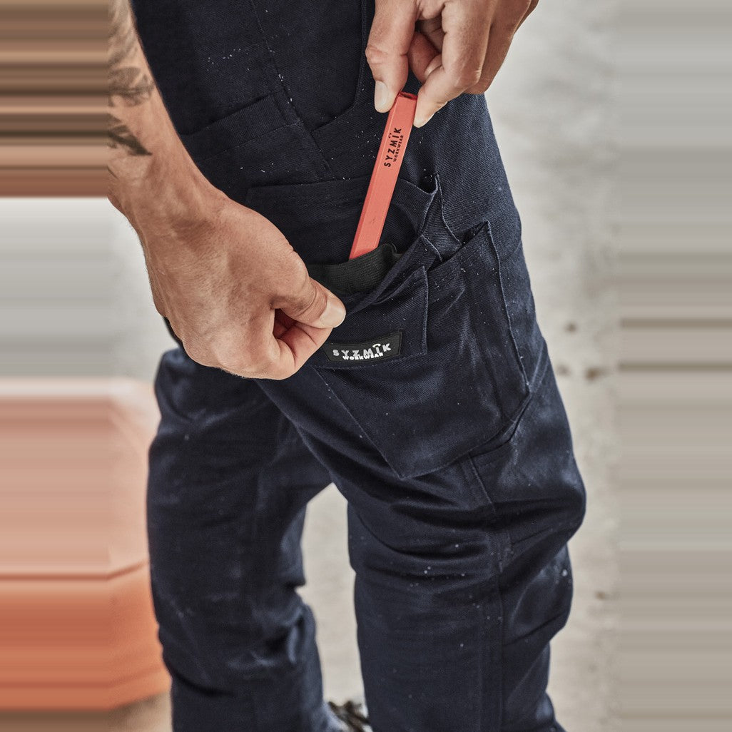 Syzmik Mens Rugged Cooling Stretch Pant ZP604 in Navy, worn by model, view 3