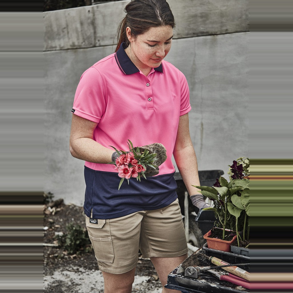 Syzmik Womens Essential Stretch Cargo Short ZS735 in Khaki, worn by model