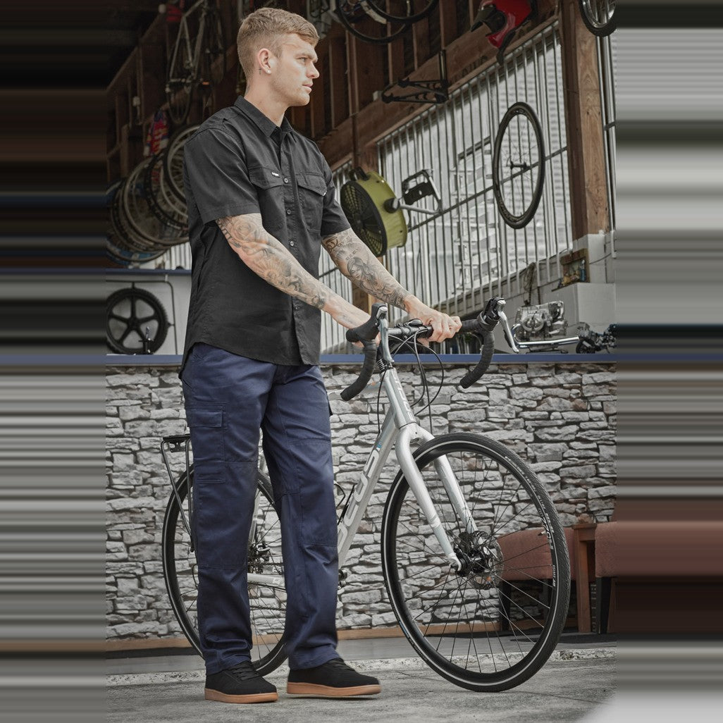 Syzmik Mens Midweight Drill Cargo Pant (Stout) ZW001S in Navy, worn by model